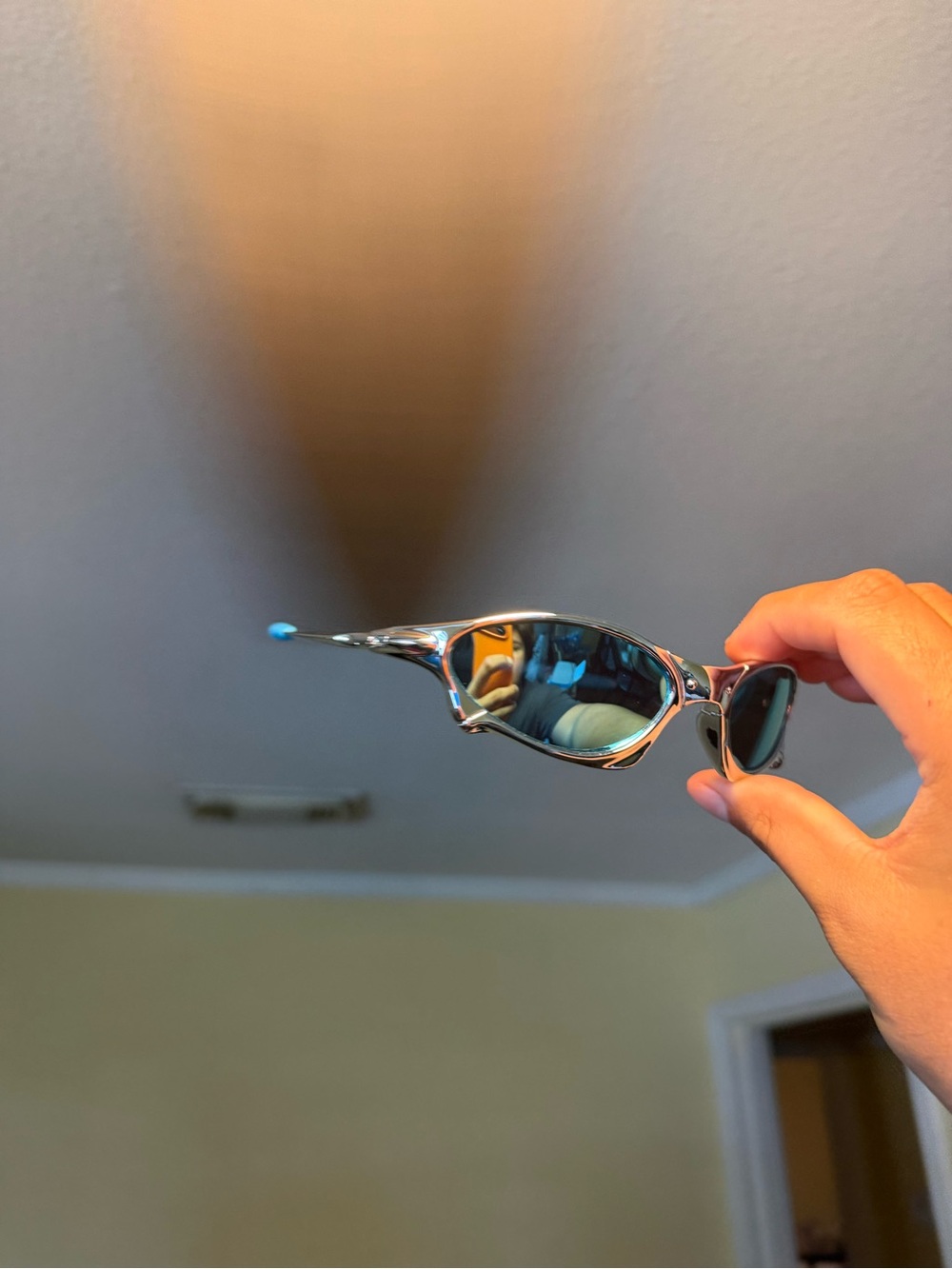 Sleek Silver Frame Sunglasses with Blue Mirrored Lenses Oakley Oakleys